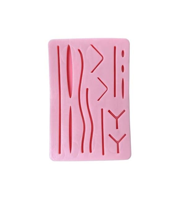 Cerrahi sütür Pedi